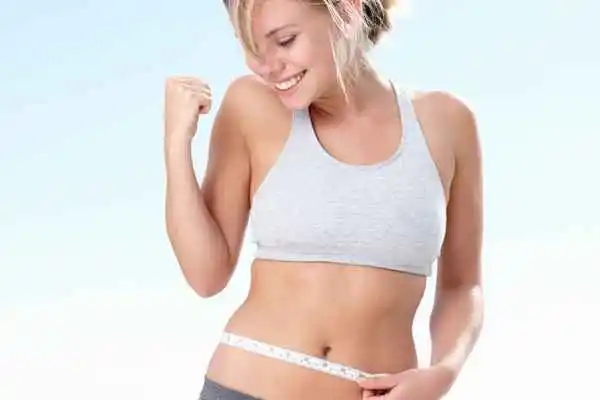 woman happy after fat reduction treatment Kensington and Chelsea