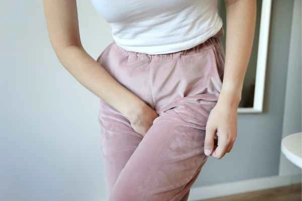 older woman running to the toilet because of urinary incontinence Kensington and Chelsea